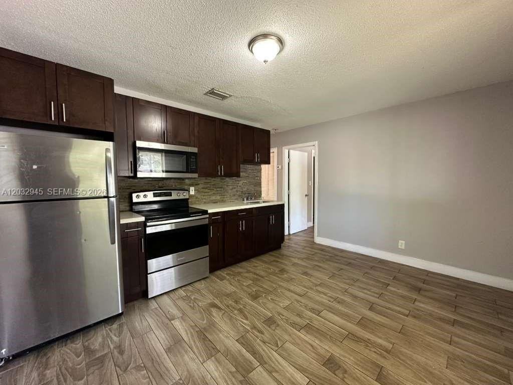 647 Nw 3rd Ave #1 - Photo 3 of 9