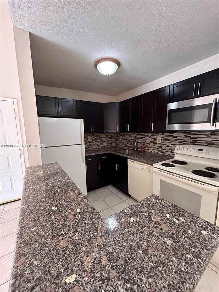 15630 Sw 80th St #I305 - Photo 2 of 12