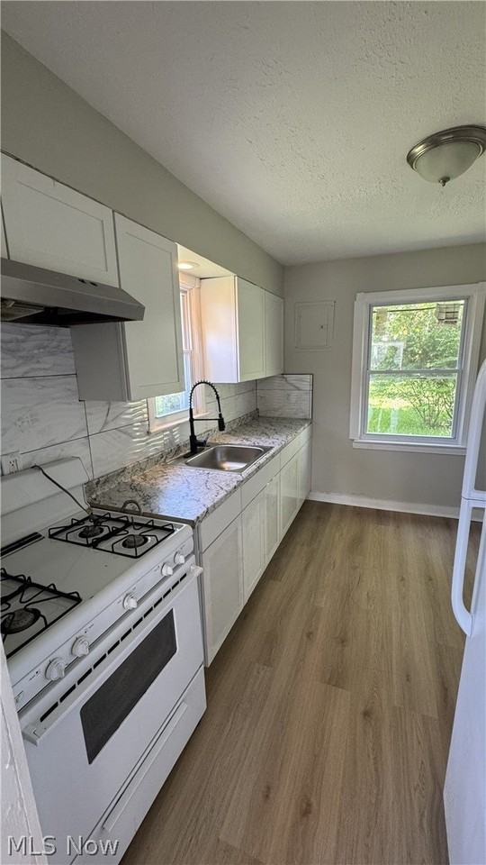 11825 Avon Ave - Photo 3 of 9