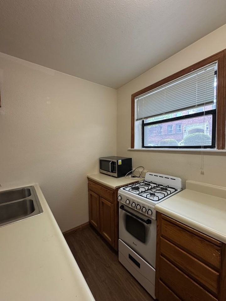 Regis Apartments - Photo 6 of 16