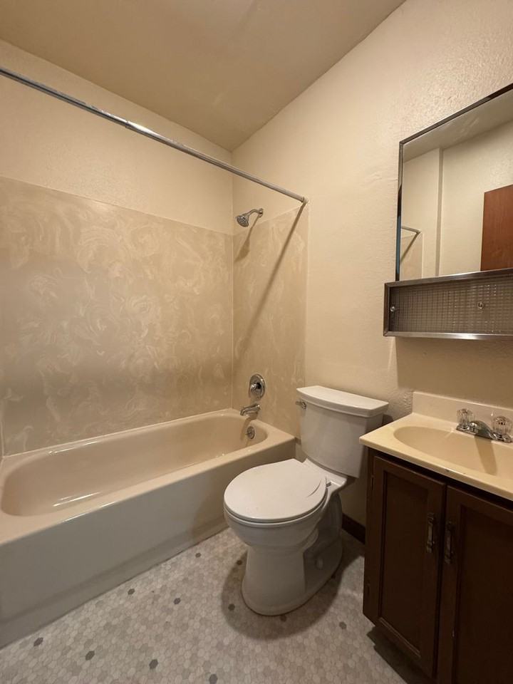 Regis Apartments - Photo 7 of 16