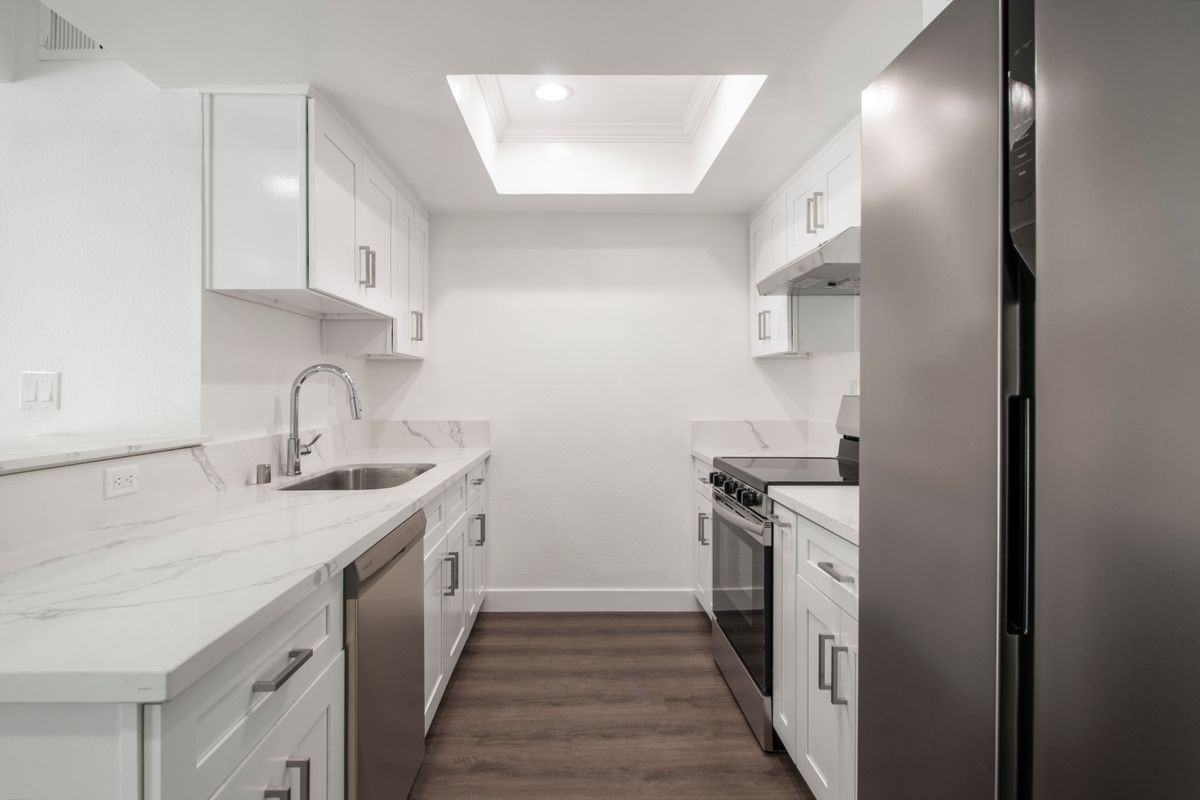 9055 Alcott St ##101 - Photo 3 of 4