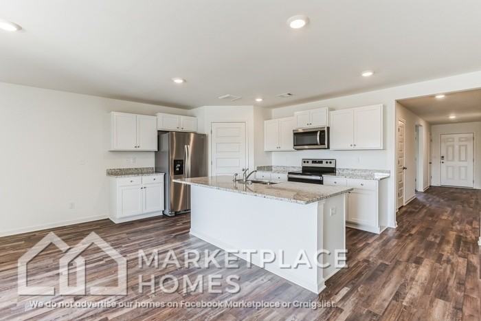 7335 Wilburton Ln - Photo 4 of 33