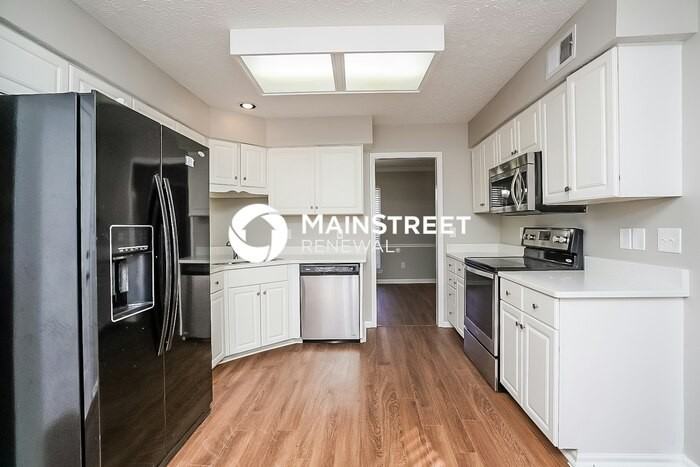 1425 Aaronwood Dr - Photo 6 of 17