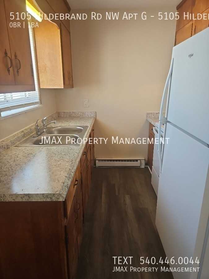 5105 Hildebrand Rd Nw Apt G - Photo 7 of 9