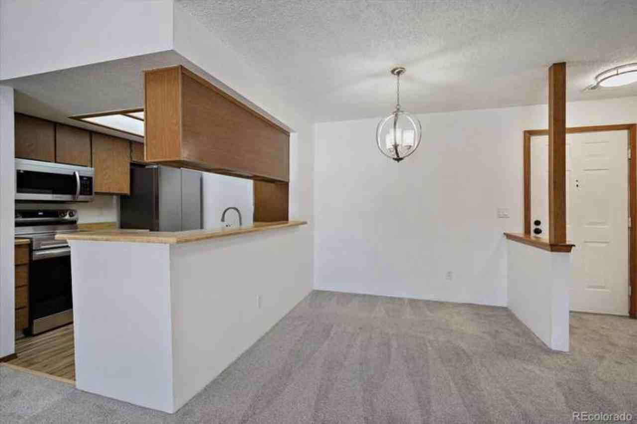 7870 W 87th Dr #E - Photo 3 of 14
