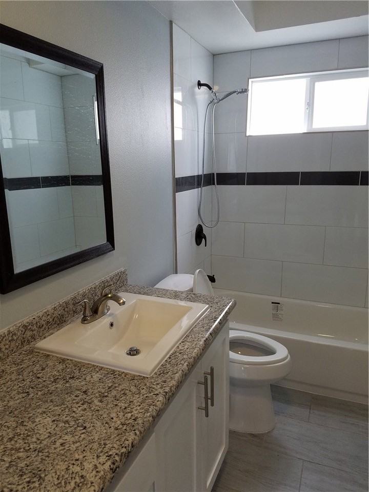 706 W 104th Pl - Photo 5 of 8