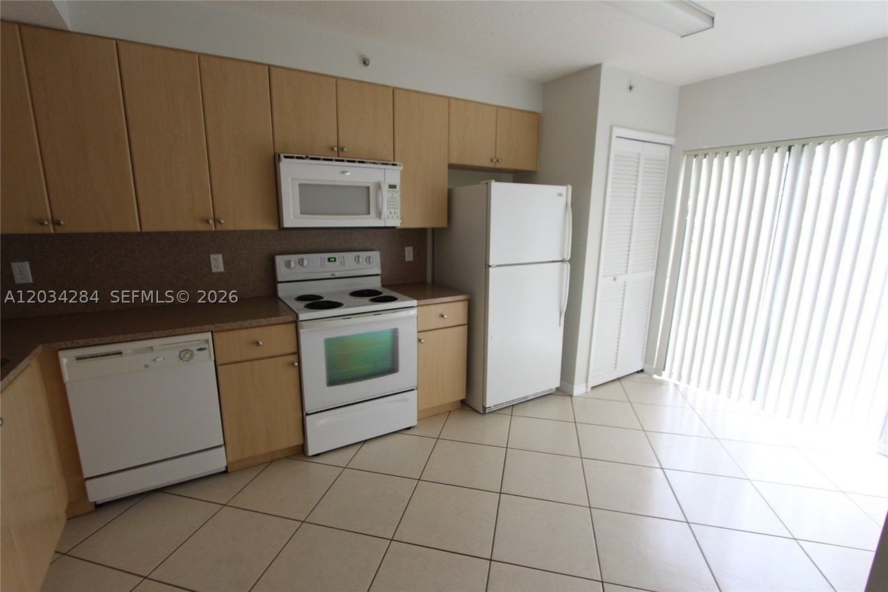 22931 Sw 88th Pl #105 - Photo 2 of 20