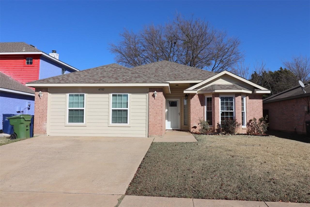 4702 Grovetree Ln - Photo 2 of 13