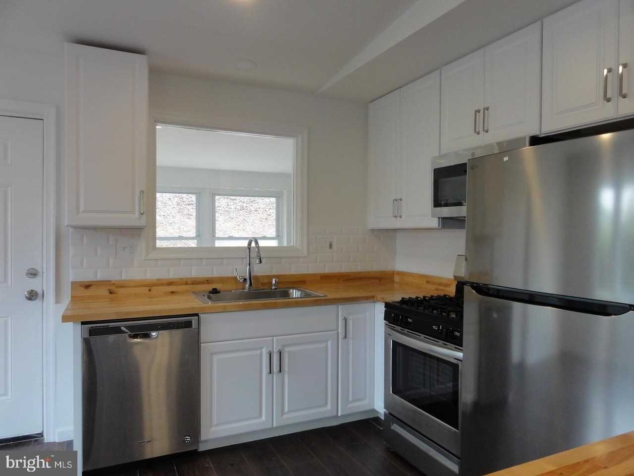 7029 Woodley Ln - Photo 6 of 27