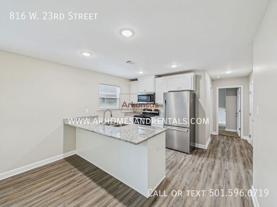816 W 23rd St - Photo 4 of 13