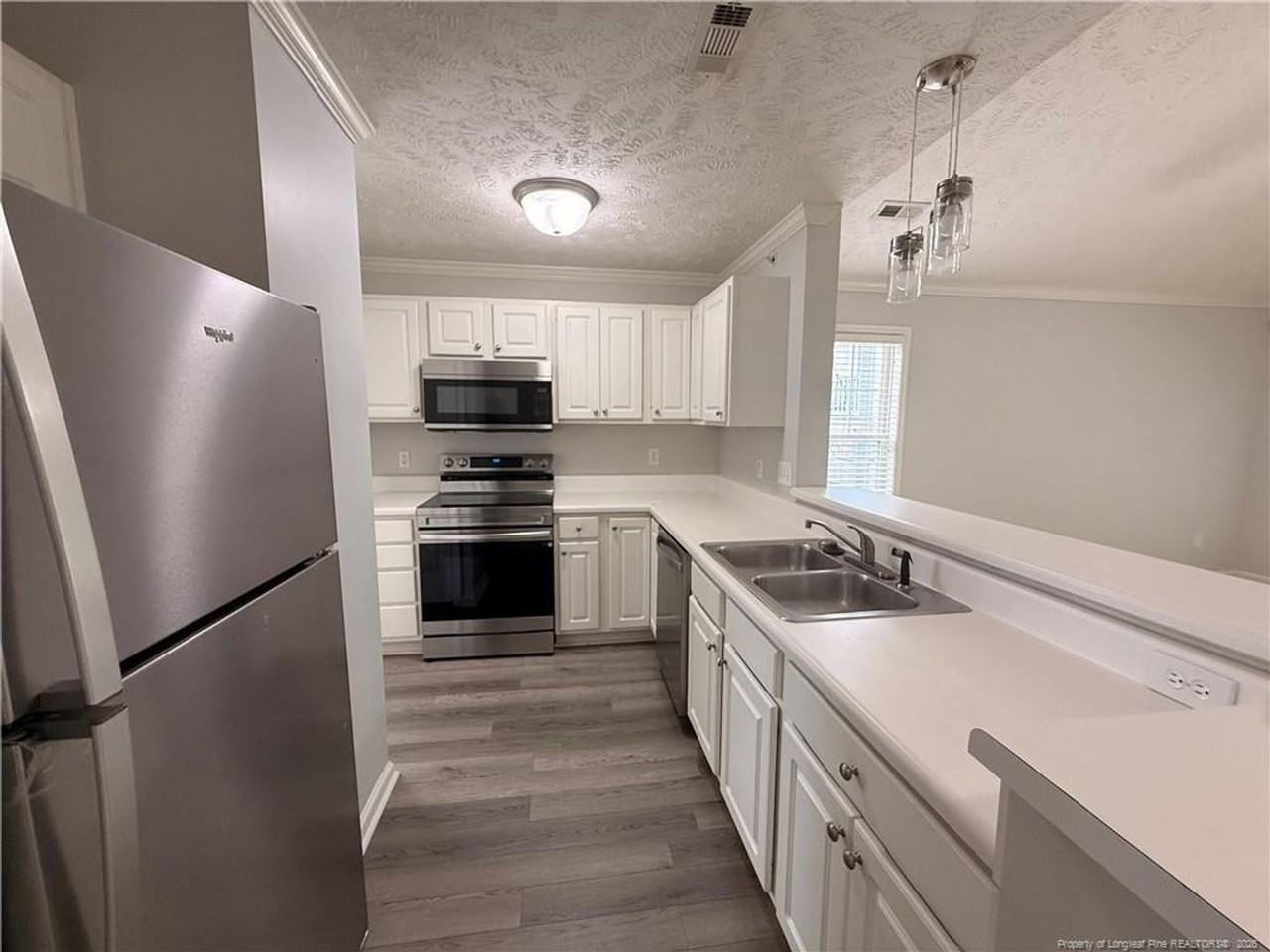 3342 Harbour Pointe Pl #9 - Photo 3 of 16
