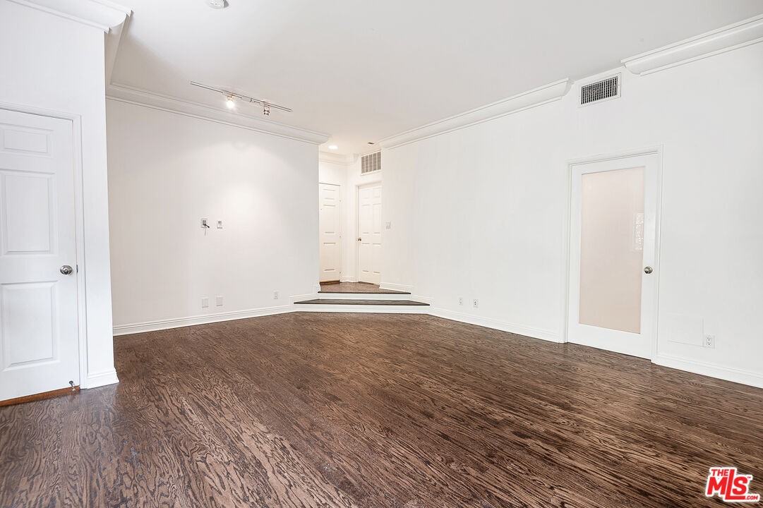 315 N Swall Dr #303 - Photo 2 of 8