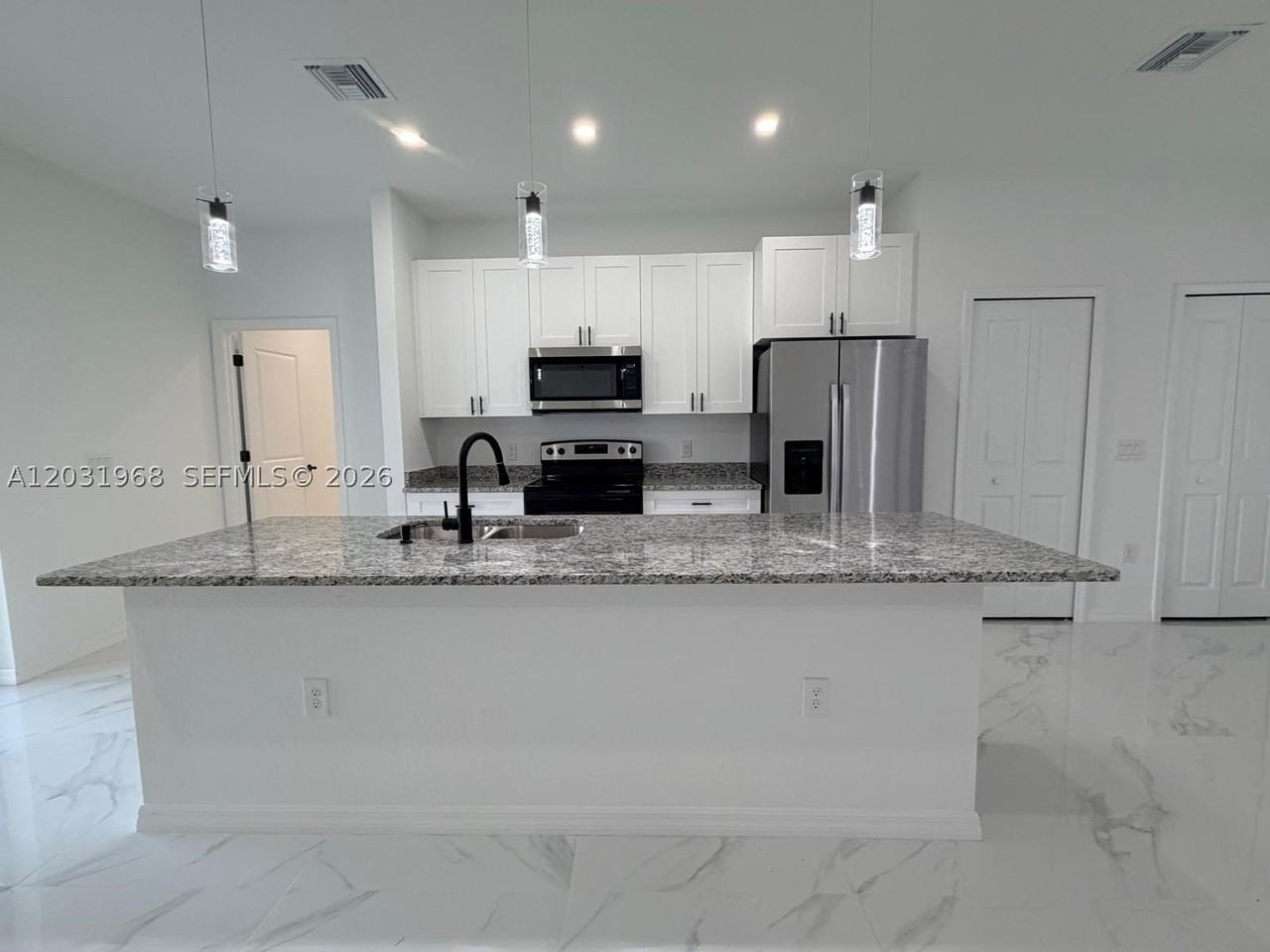 2706 72nd St W - Photo 5 of 21