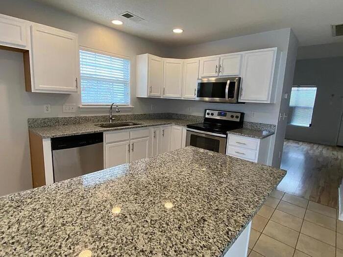 12131 Bottlebrush Pl - Photo 2 of 17