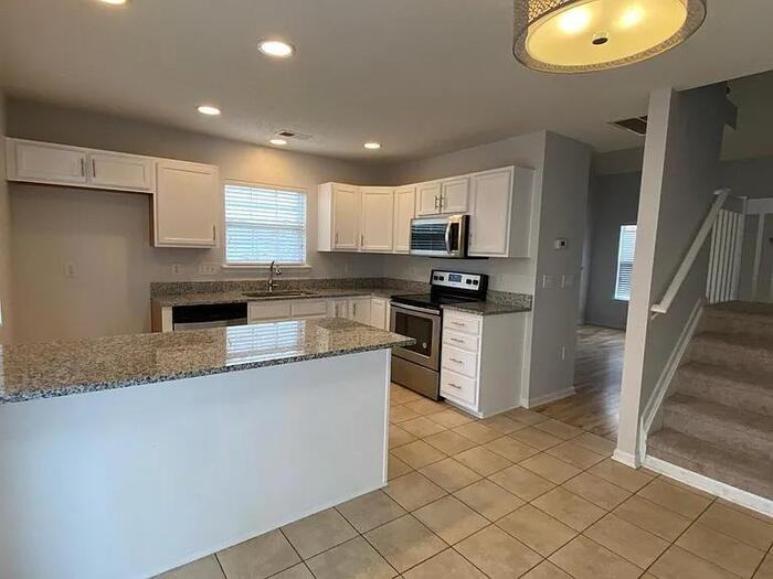 12131 Bottlebrush Pl - Photo 3 of 17