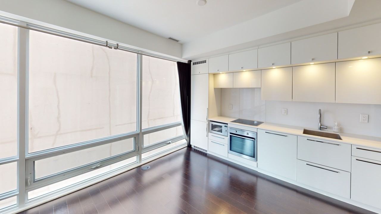 KARMA CONDOS - Photo 3 of 7
