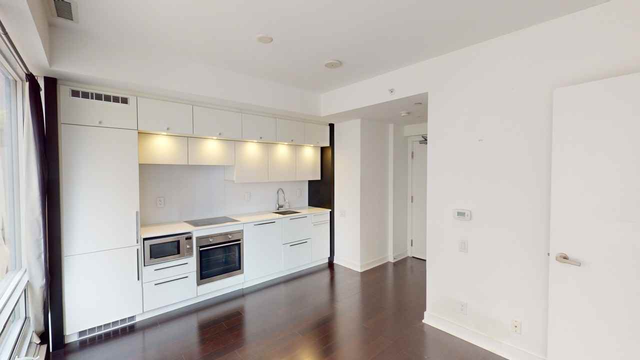 KARMA CONDOS - Photo 4 of 7