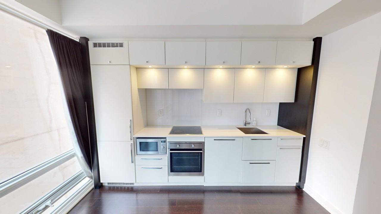 KARMA CONDOS - Photo 5 of 7