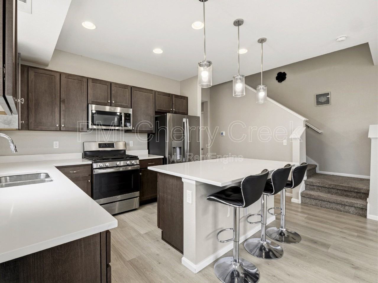 6419 N Dunkirk St - Photo 5 of 25