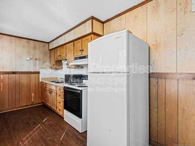 113 Se Delaware Ave - Photo 5 of 16