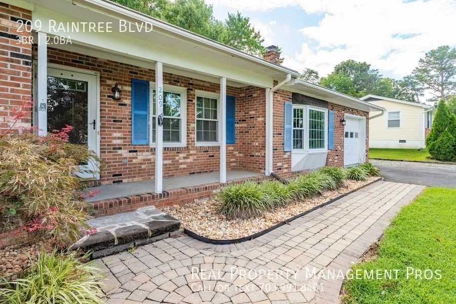 209 Raintree Blvd - Photo 2 of 48
