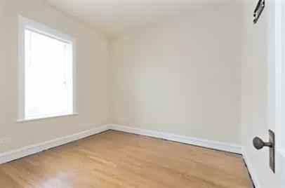7556 South Champlain Avenue - Photo 2 of 8