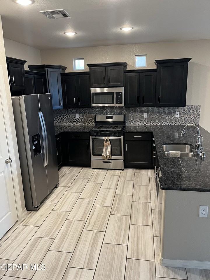 14823 Pebble Hills Blvd - Photo 2 of 16