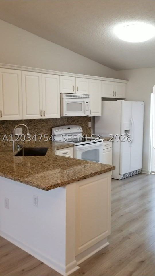 7730 W 34th Ln #14-202 - Photo 2 of 11