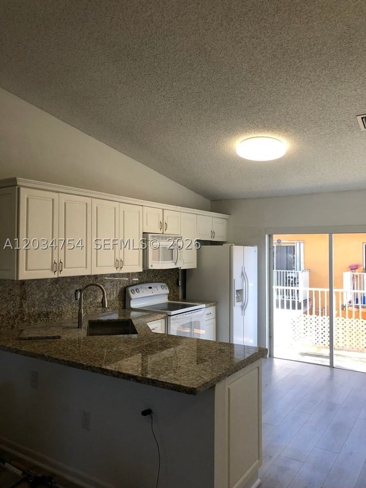 7730 W 34th Ln #14-202 - Photo 3 of 11