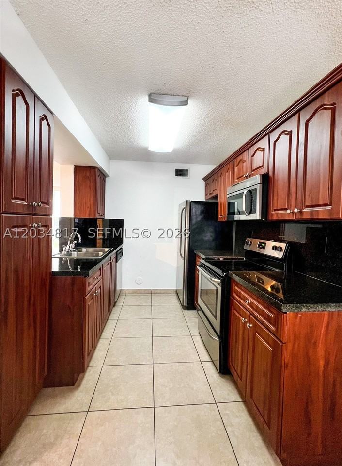 9767 Nw 46th Ter #109 - Photo 3 of 18