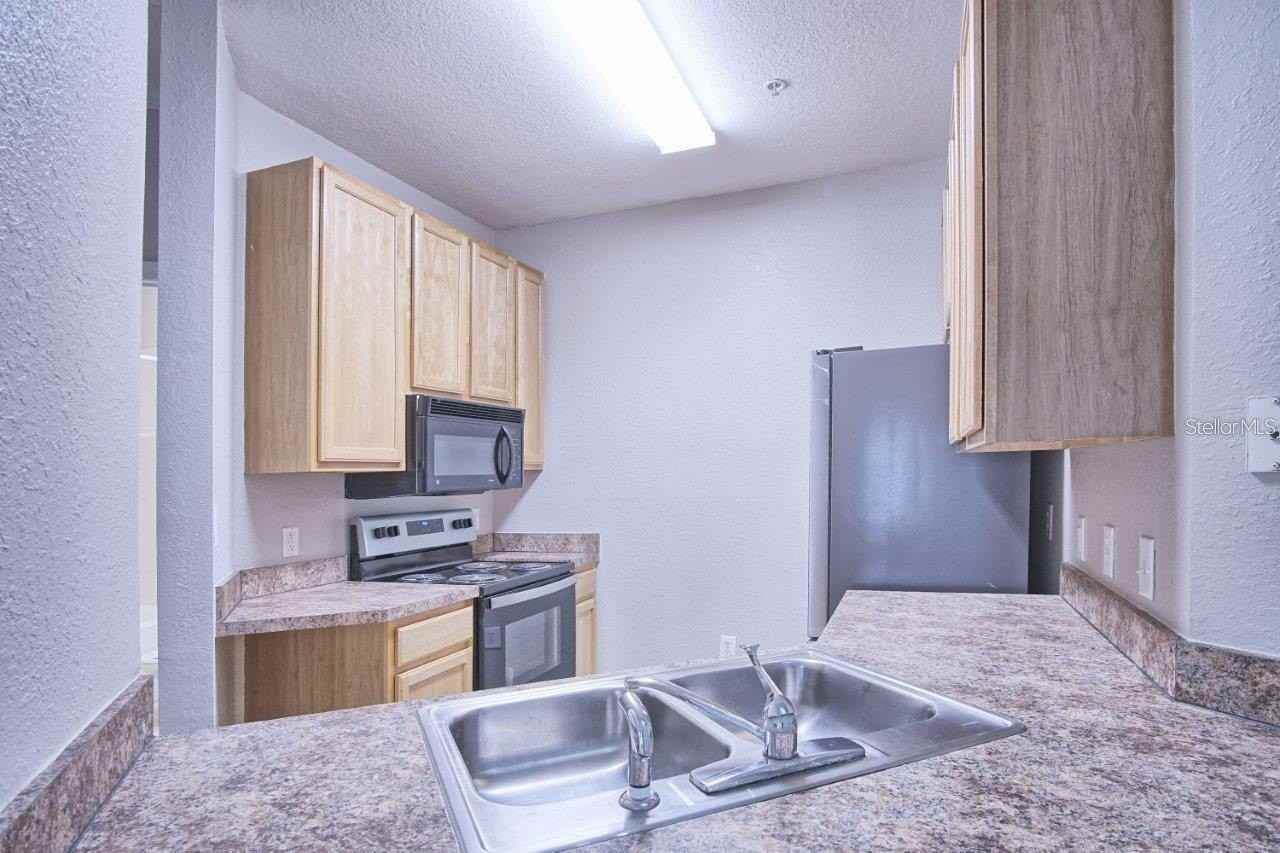 10019 Courtney Palms Blvd #302 - Photo 4 of 26