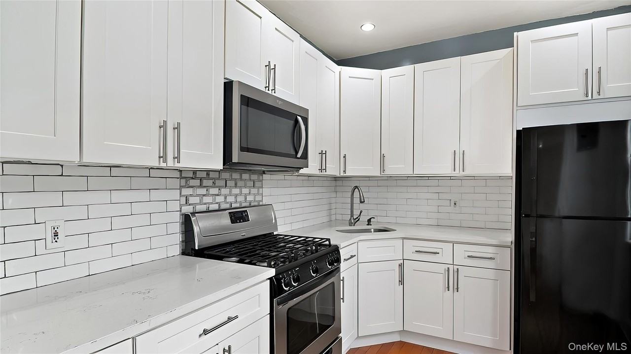 1129 E 221st St - Photo 2 of 16