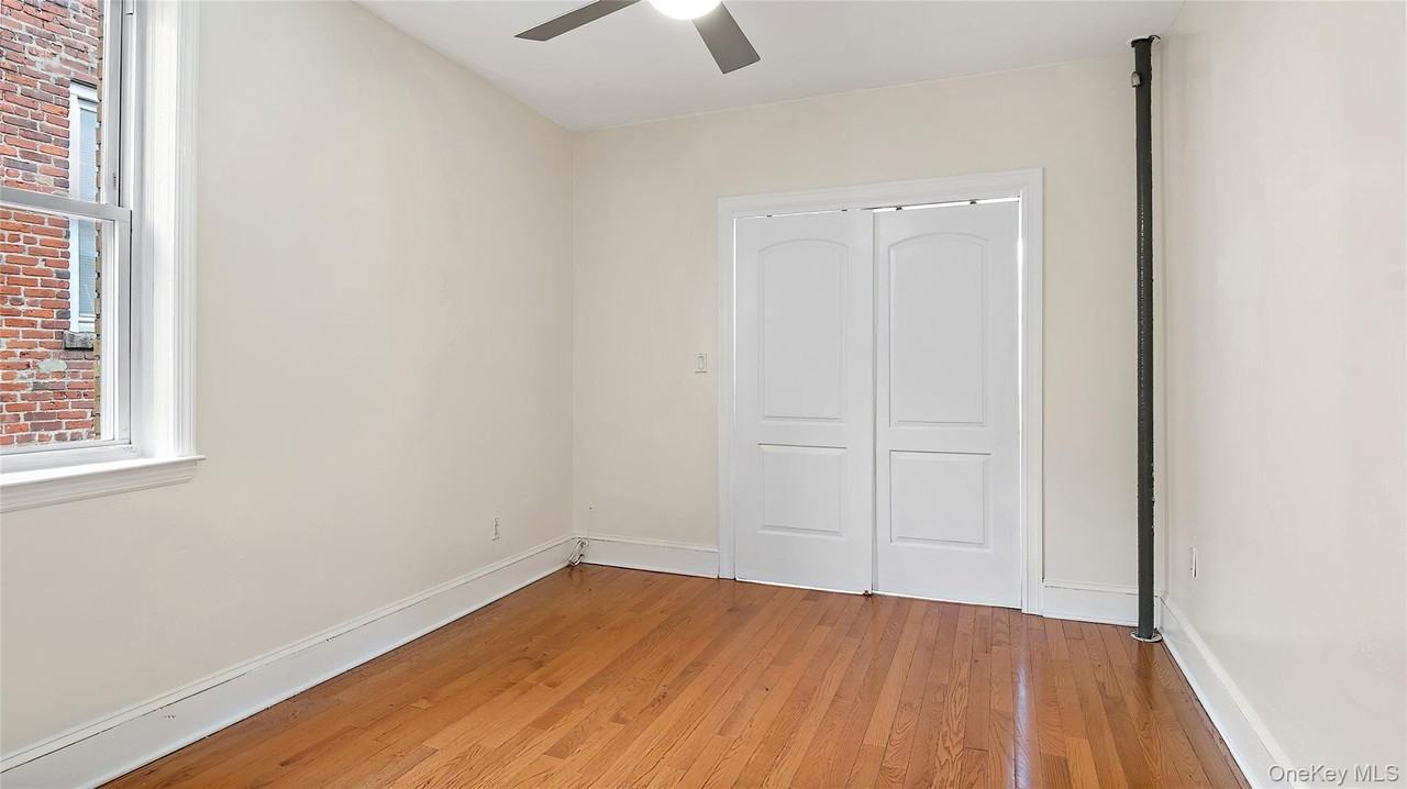 1129 E 221st St - Photo 3 of 16