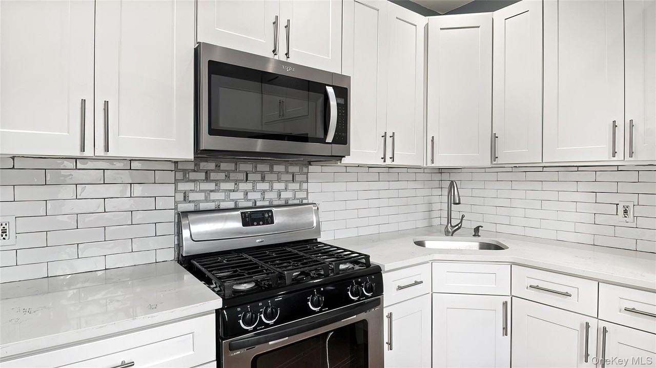 1129 E 221st St - Photo 4 of 16