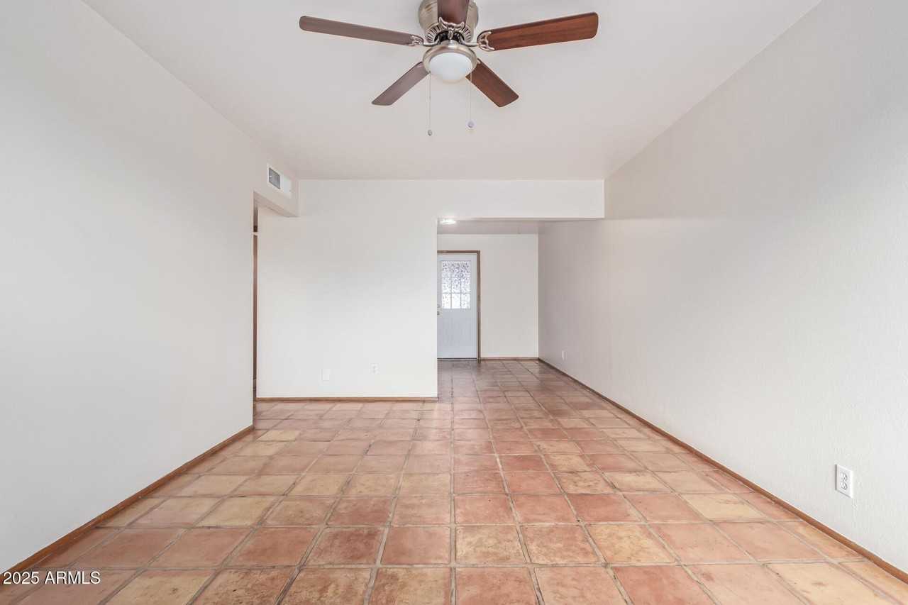 7153 N 57th Dr Apt 3 - Photo 6 of 26