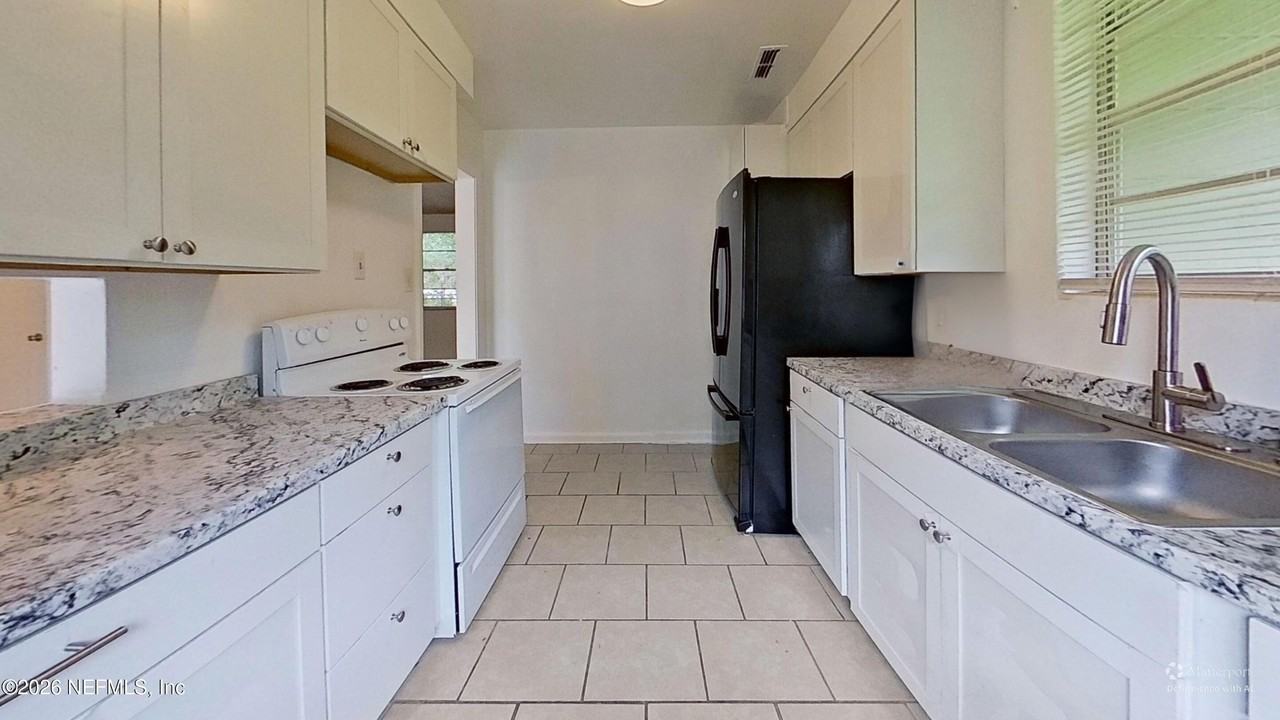 7104 Waikiki Rd - Photo 6 of 17