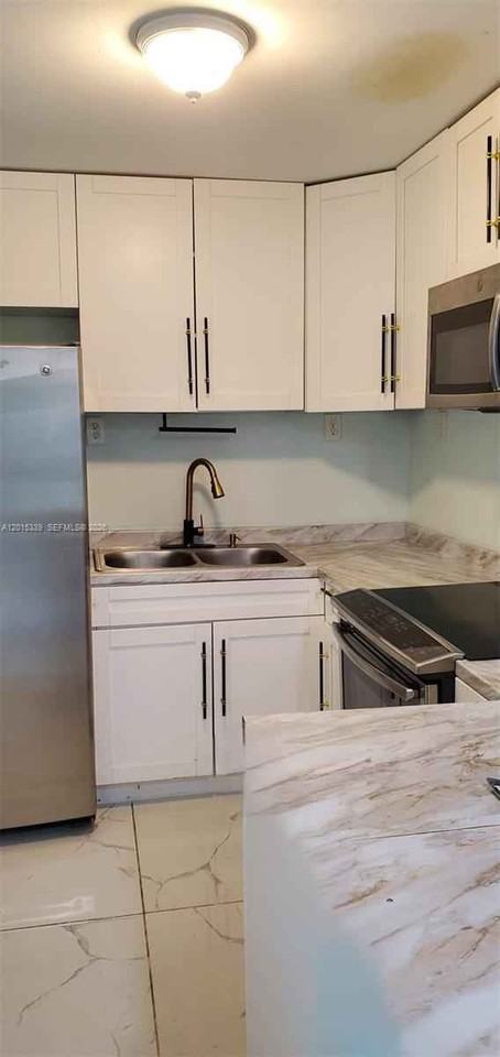 1430 Ne 175th St - Photo 6 of 35