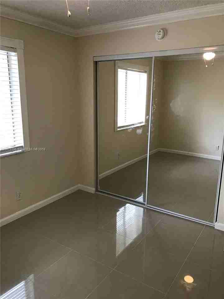 107 Gardens Dr #202 - Photo 4 of 12