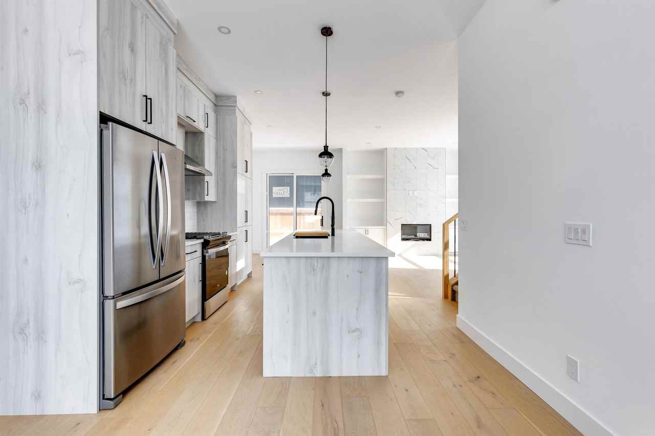 2144 51 Avenue SW, Calgary - N/A - Photo 2 of 50