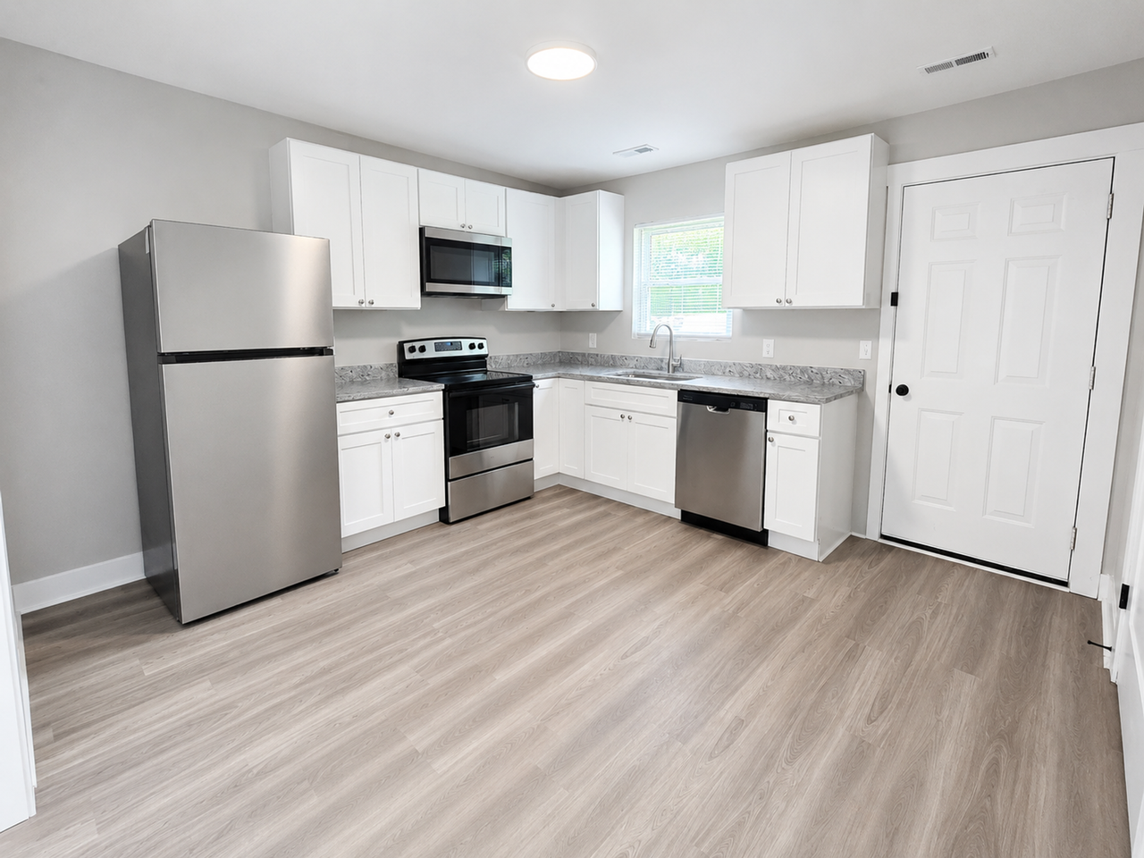 Welcome to West Eastland Townhomes! - Photo 3 of 13