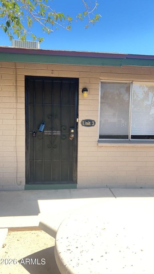 7153 N 57th Dr Apt 3 - Photo 3 of 26