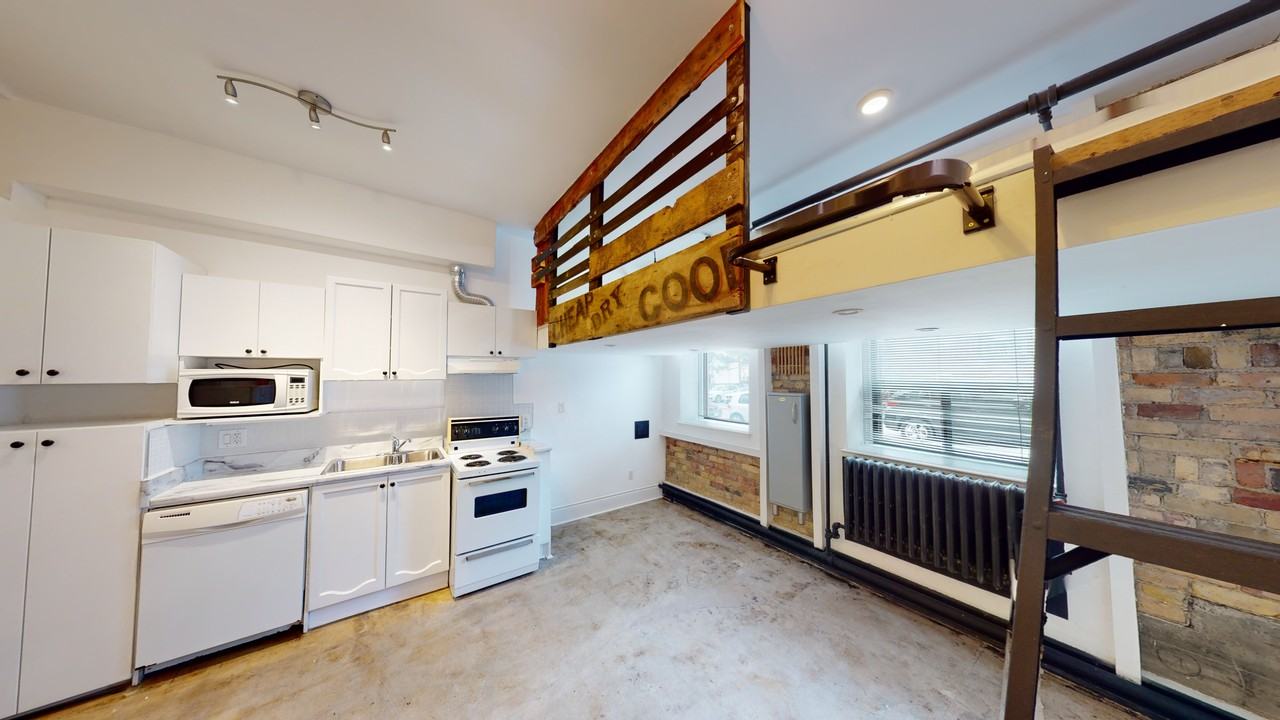 1152 Gerrard St E - Photo 2 of 32