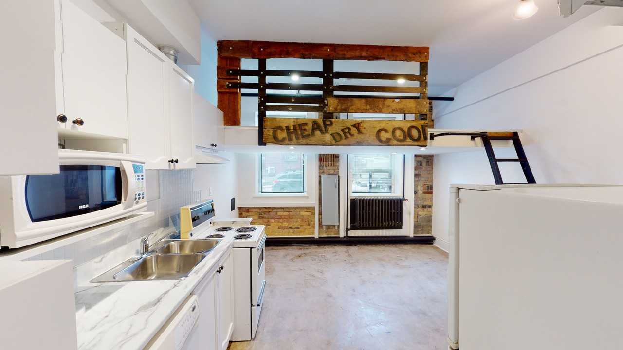 1152 Gerrard St E - Photo 5 of 32