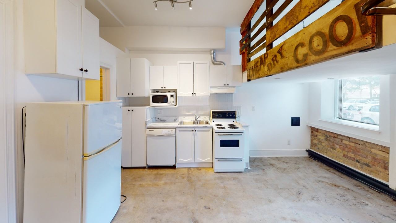 1152 Gerrard St E - Photo 7 of 32