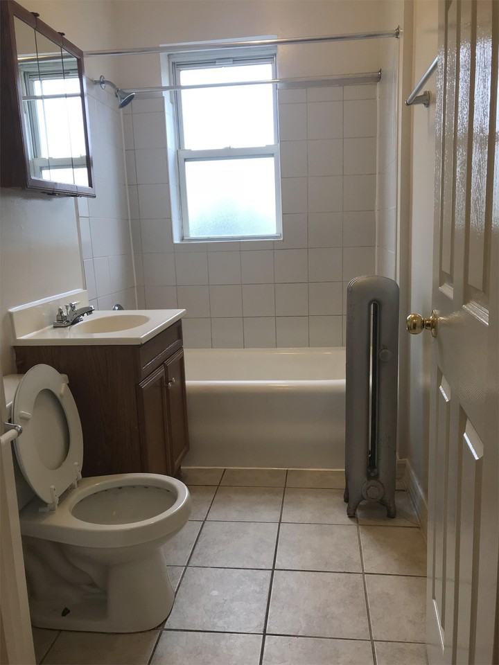71st and Rhodes LLC - Photo 5 of 9