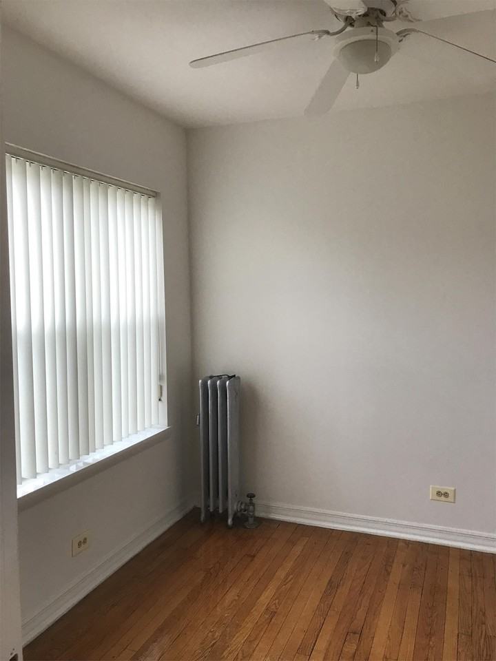 71st and Rhodes LLC - Photo 7 of 9