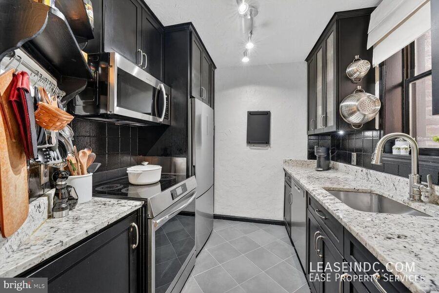 2310 Ashmead Pl Nw #205 - Photo 7 of 18