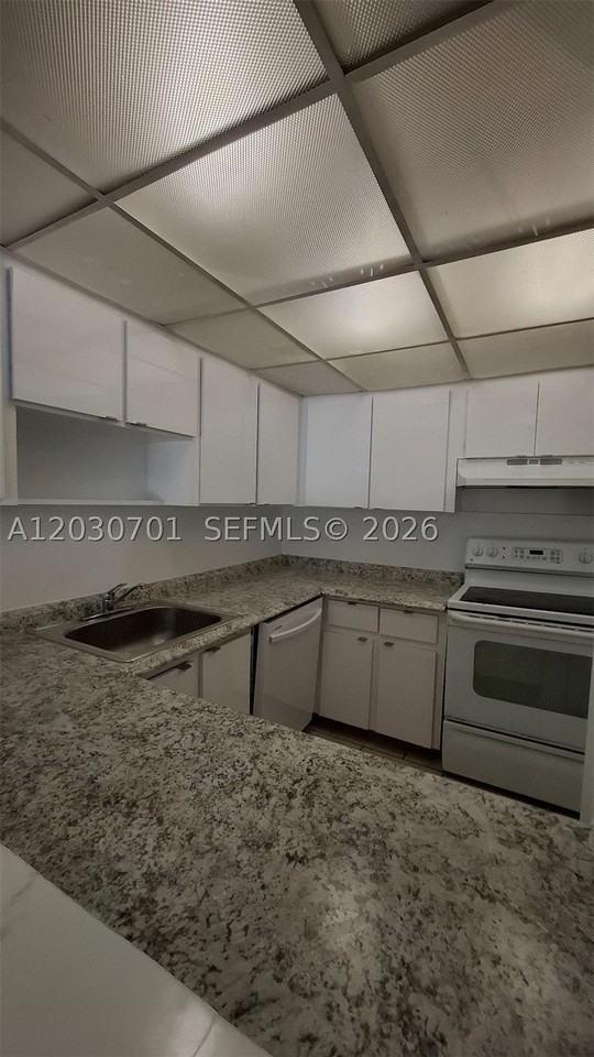 6950 Nw 186th St #2-304 - Photo 2 of 4