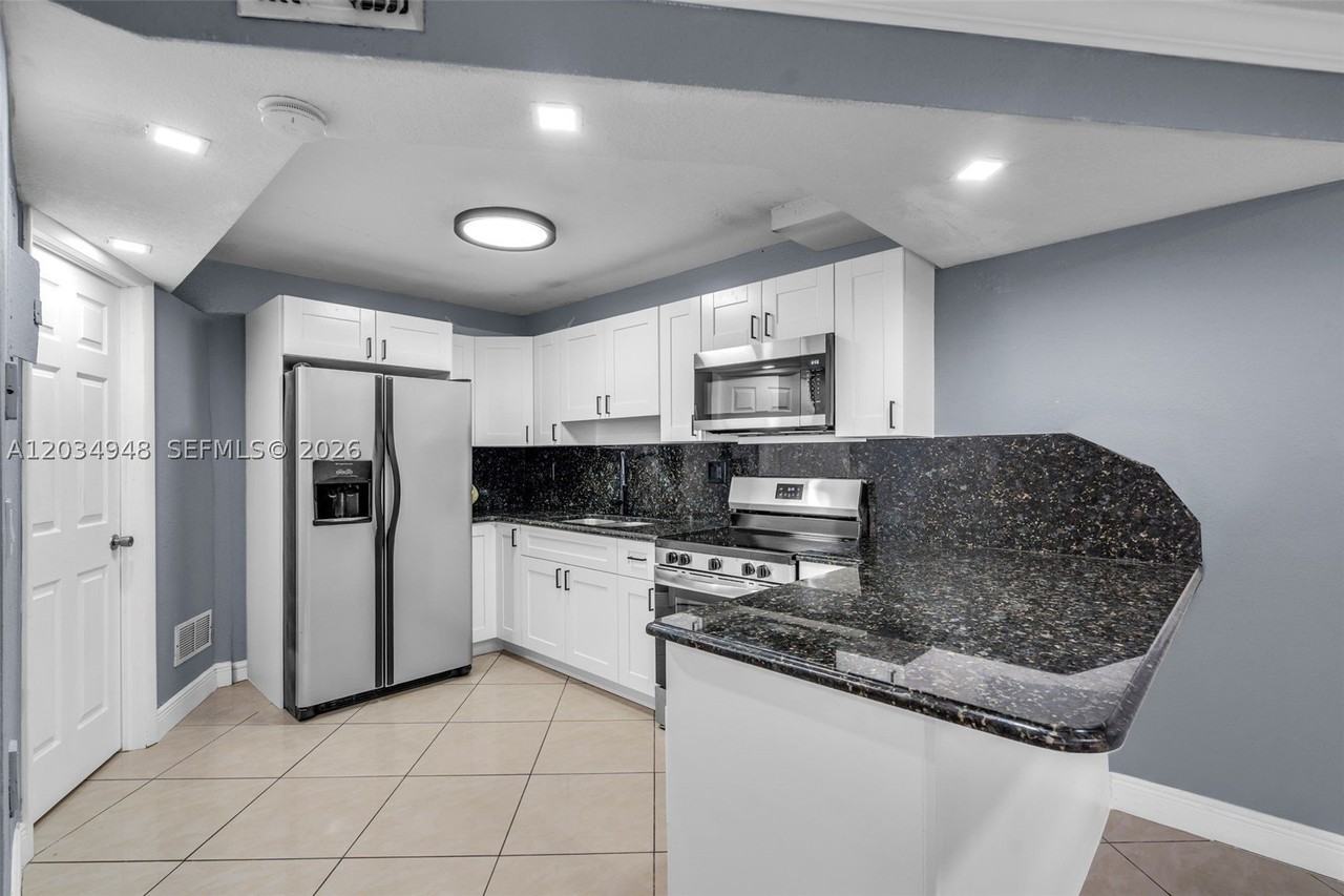 5335 W 23rd Ct #13-4 - Photo 5 of 24
